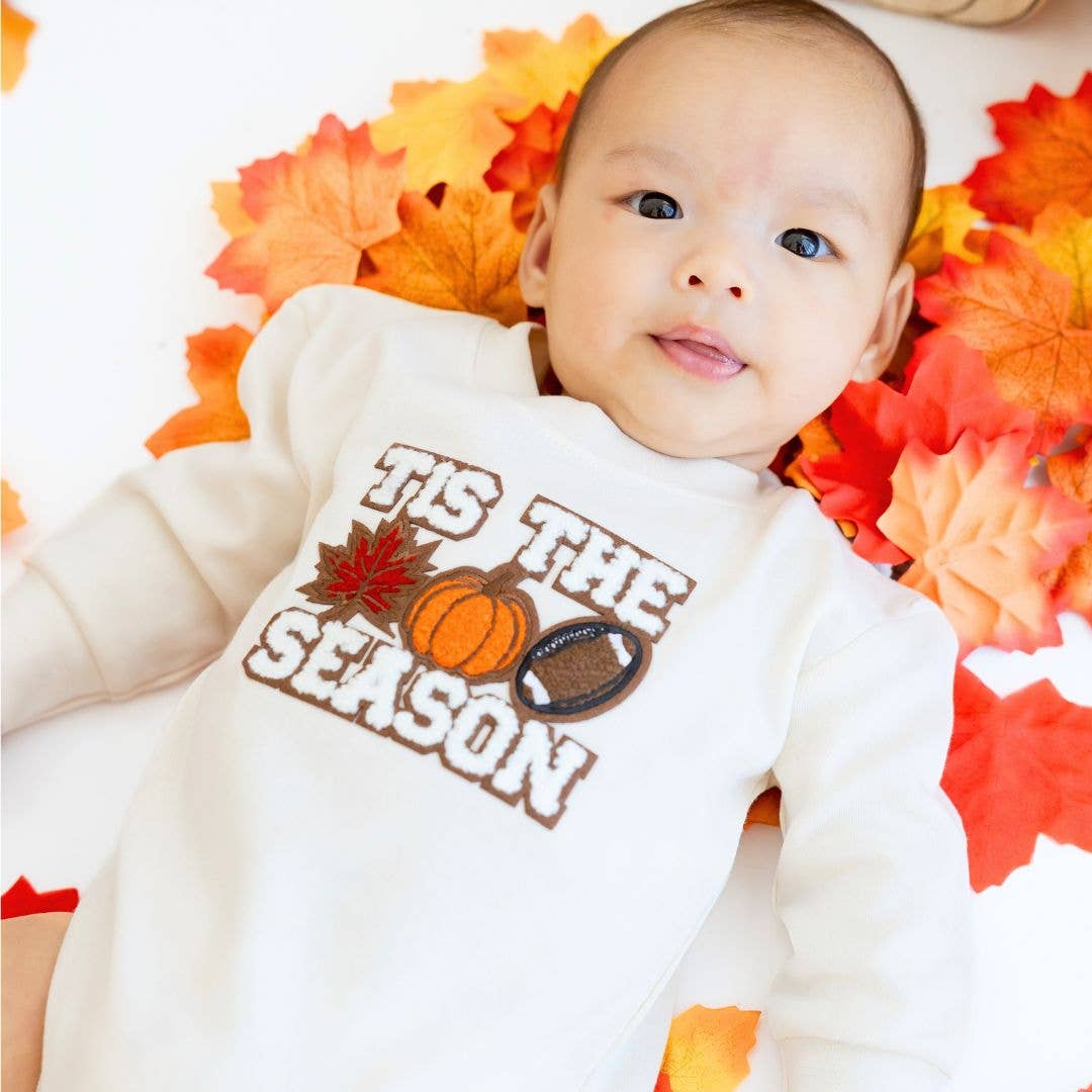 Natural cotton long-sleeve romper with multicolor chenille pumpkin patch and brown felt outline