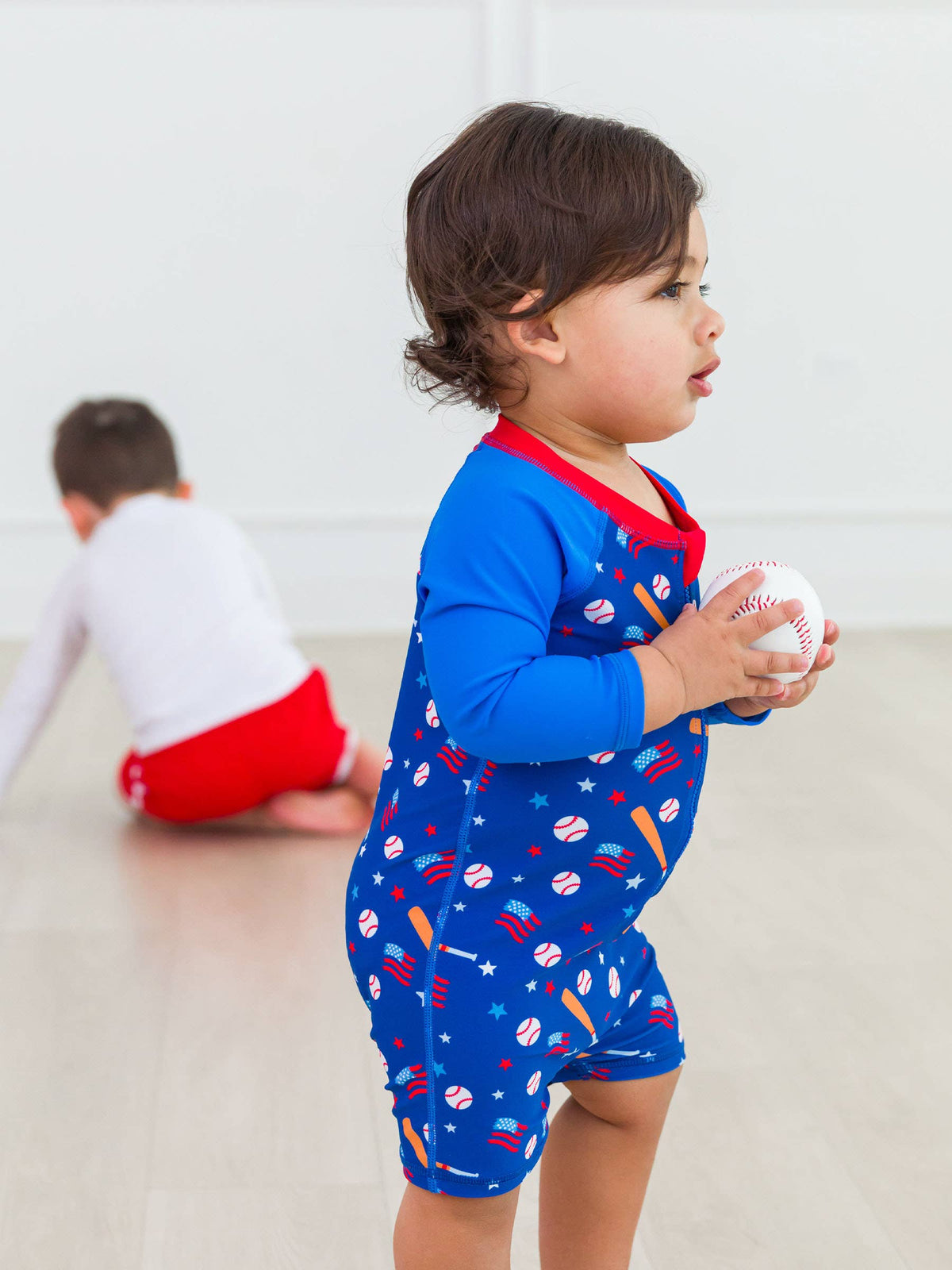 RuggedButts - Baby Boys Play Ball Long Sleeve One Piece Rash Guard Swimsuit