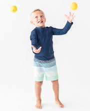 Load image into Gallery viewer, RuffleButts + RuggedButts - Boys Navy Long Sleeve Rash Guard
