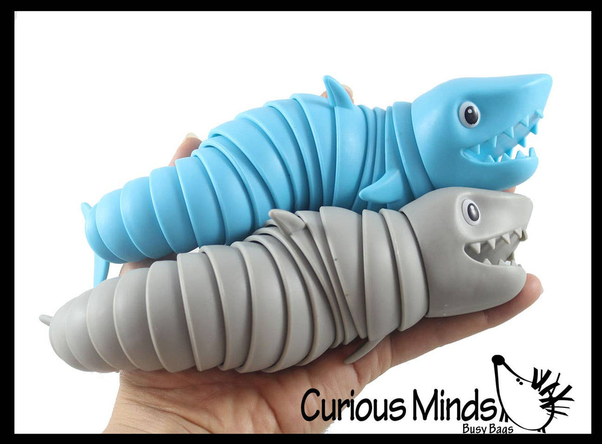 Articulated shark fidget toy with connected hard plastic segments in jointed design