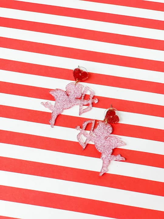 Acrylic glitter cupid dangle earrings in refined sparkle detail