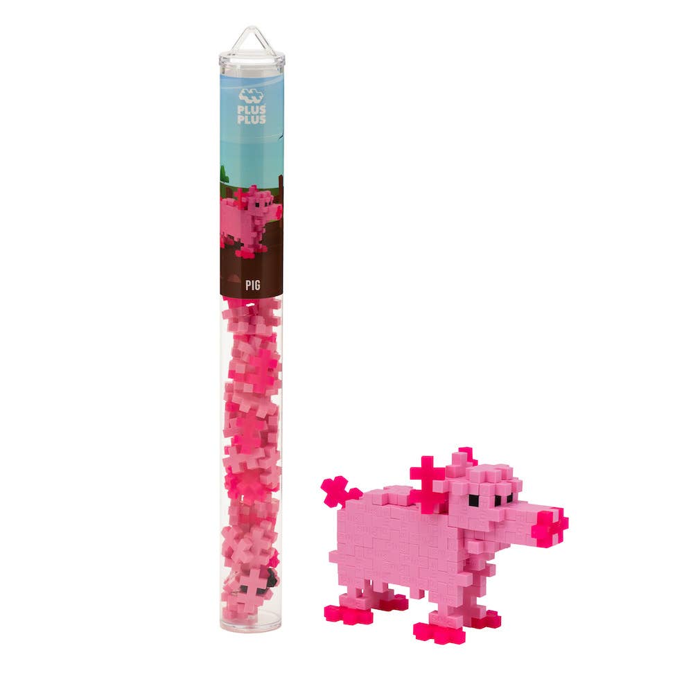 Plus-Plus Tube Pig building toy with 70+ interlocking pieces and travel-friendly container