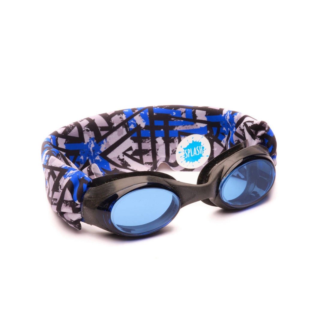 Our The Maze swim goggles feature our tangle-free, patent-pending strap in blue, grey and black paired with a black frame with lightly tinted blue lenses. One size fits kids to adults. Ages 3+. No more pulled or tangled hair. Fun, fashionable, comfortable. High visibility, anti-fog lenses. Shatter resistant polycarbonate lenses. Hypoallergenic—latex & pvc free. Sensory friendly.