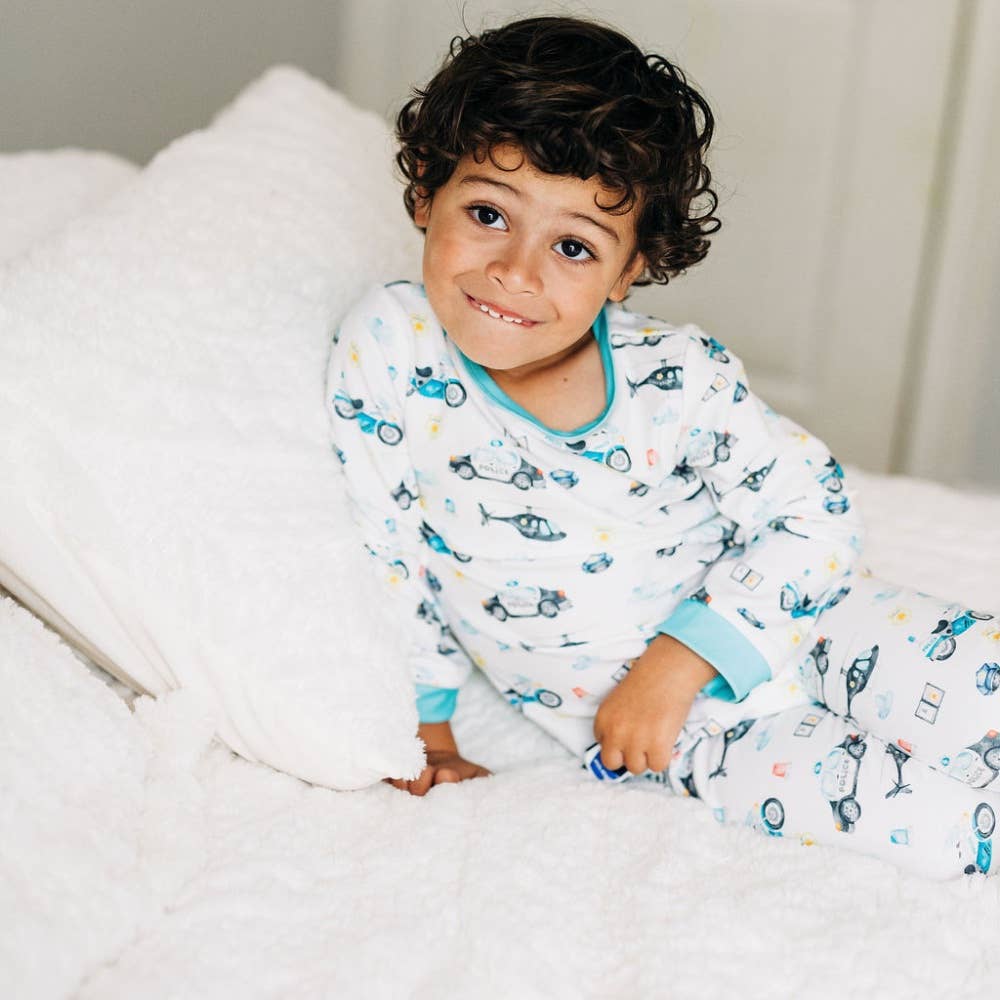 White and blue police-print two-piece pajamas by Sugar Bee Clothing