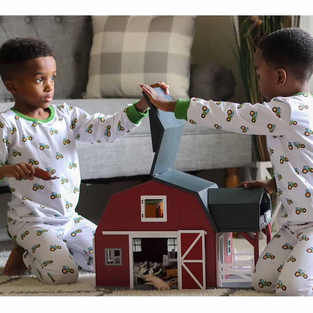 SugarBeeBlanks tractor pajamas, two-piece cotton set with green trim and faux flap detail