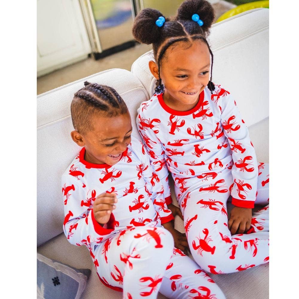 Sugar Bee Clothing Crawfish Buttflap Pajamas in light blue with red buttflap detail