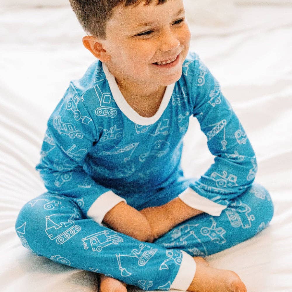 Construction Buttflap PJs in neutral tone by Sugar Bee Clothing with buttflap closure detail