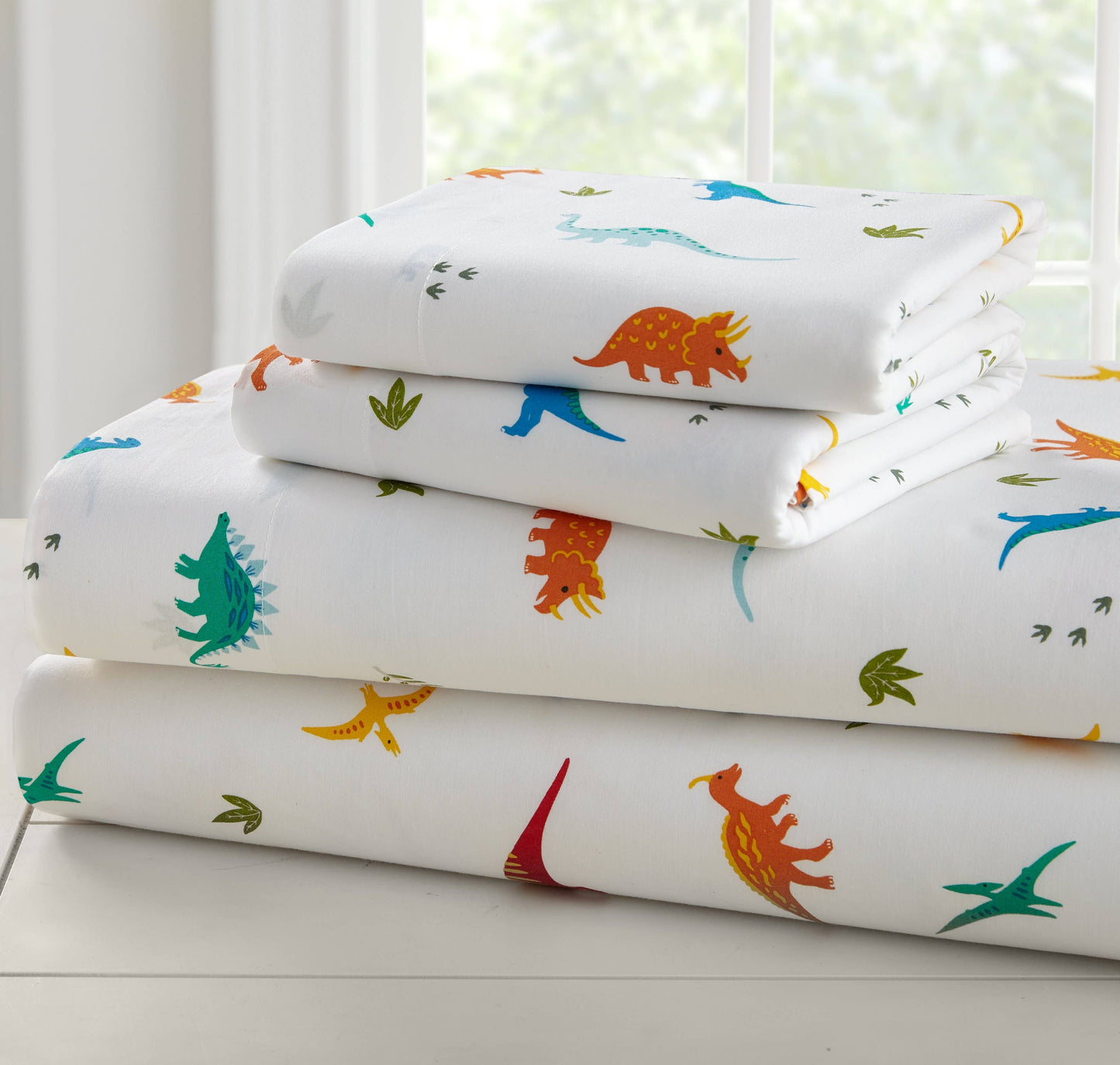 Wildkin Jurassic Dinosaurs Sheet Set in 100% cotton, toddler size, with coordinating dinosaur print design