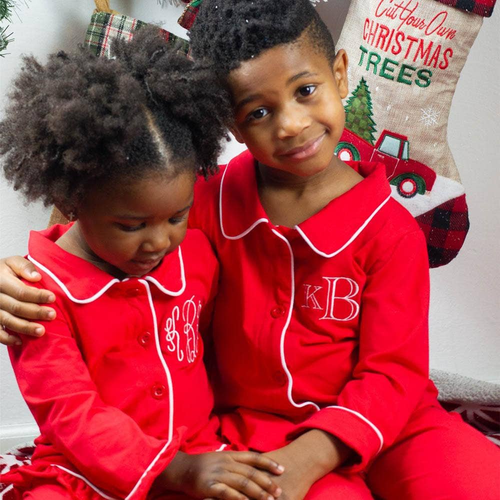 Red button-front pajamas with white piping trim by Sugar Bee Clothing