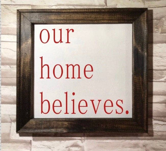 Framed canvas artwork with dark walnut frame displaying 'Belief In Santa' by Works of Panglossian