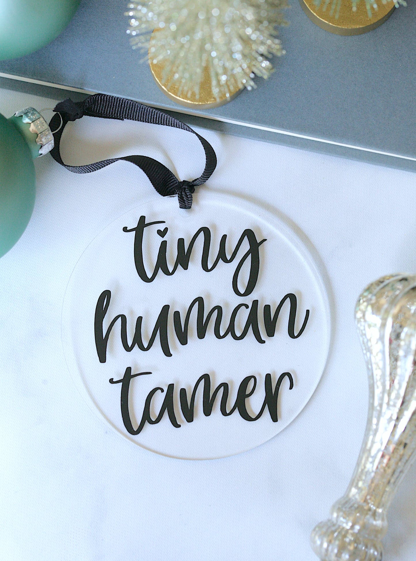 Tiny Human Tamer Acrylic Ornament by Younique, clear acrylic with vinyl detail