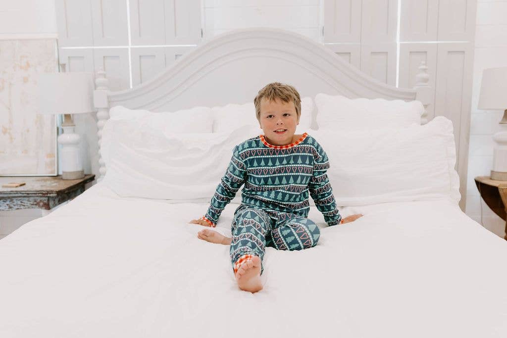 Trees and Candy Canes pajamas in dark blue with green trees, red drop seat, and gingham trim