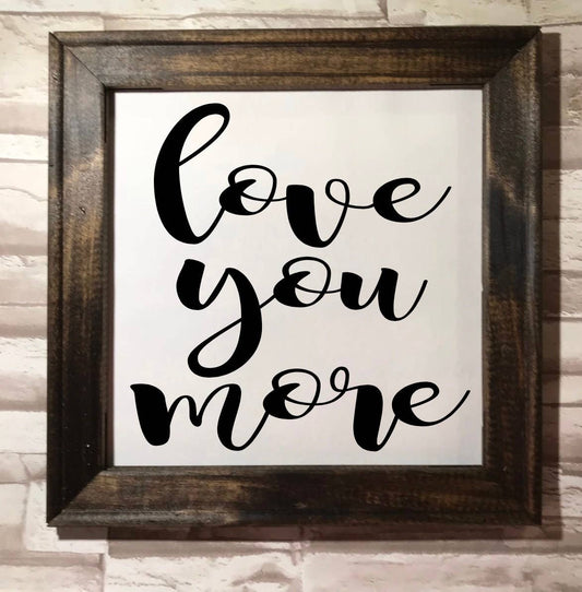 Love you more Valentine's Day framed canvas in dark walnut by Works of Panglossian