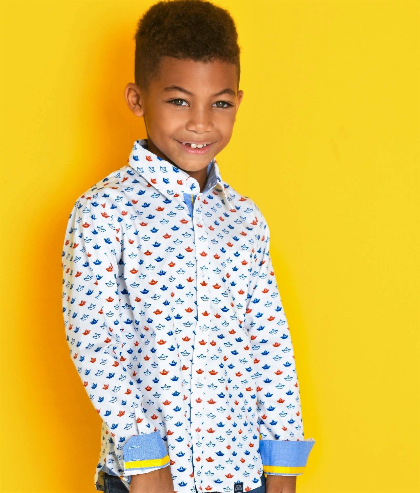 Red and blue origami sailboat shirt by TukTuk Designs with detailed collar and placket