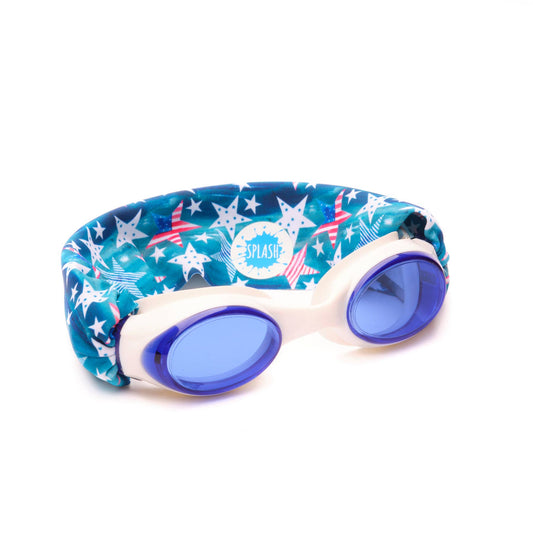 Swimming goggles with blue lenses and a white body. The strap is fabric adorned with stars that have the American flag on them. Some of the stars have smaller blue stars inside. 