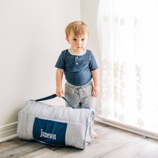 Blue seersucker nap mat with pillow and velcro closure by Sugar Bee Clothing