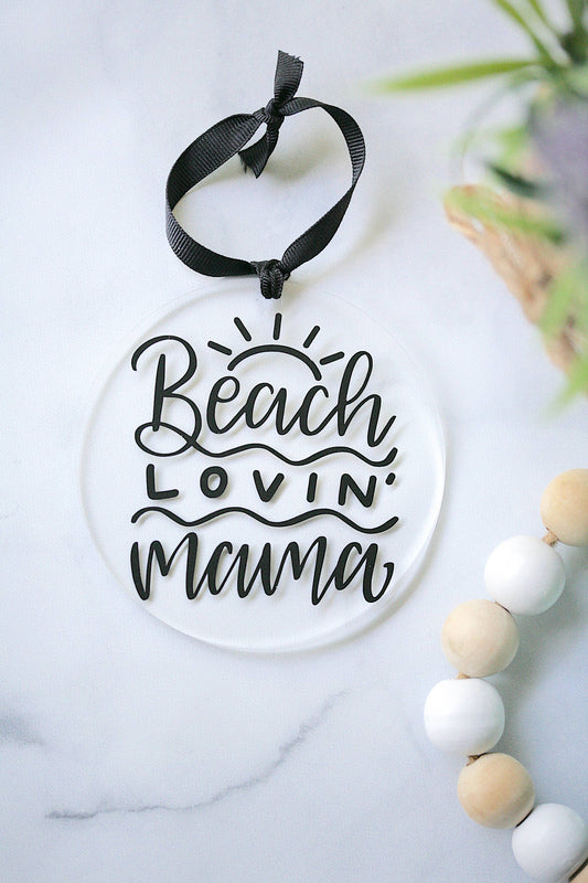 Beach Lovin Mama clear acrylic ornament by Younique, 4 inches, hanging from black ribbon