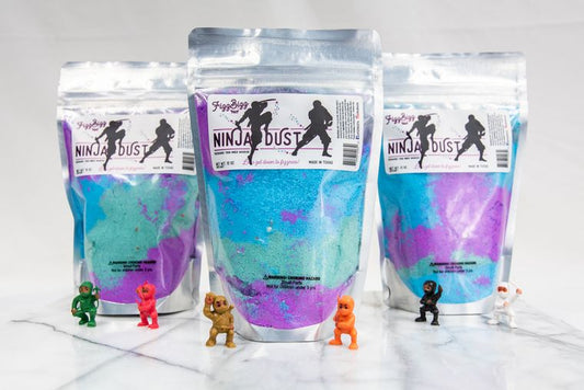Ninja Dust bath salts pouch with vibrant blue and purple colors, 12 oz size